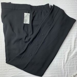 H&M women's black pants, buttons on side of leg, elastic back, 10, new with tags